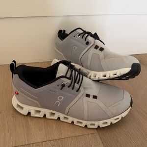 On Running Gray and Black Athletic Shoes